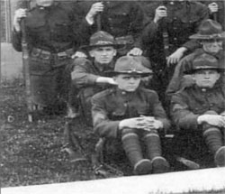 Photo of Davenport High School ROTC members watching a performance at the Armistice Day parade of 1920